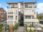 Hausansicht - Moderne Eigentumswohnung mit großem Balkon, Aufzug und Tiefgarage – neuwertig & energieeffizient